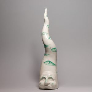 corno con maschera di pulcinella e pesciolini
